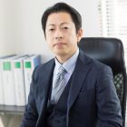塘 賢三